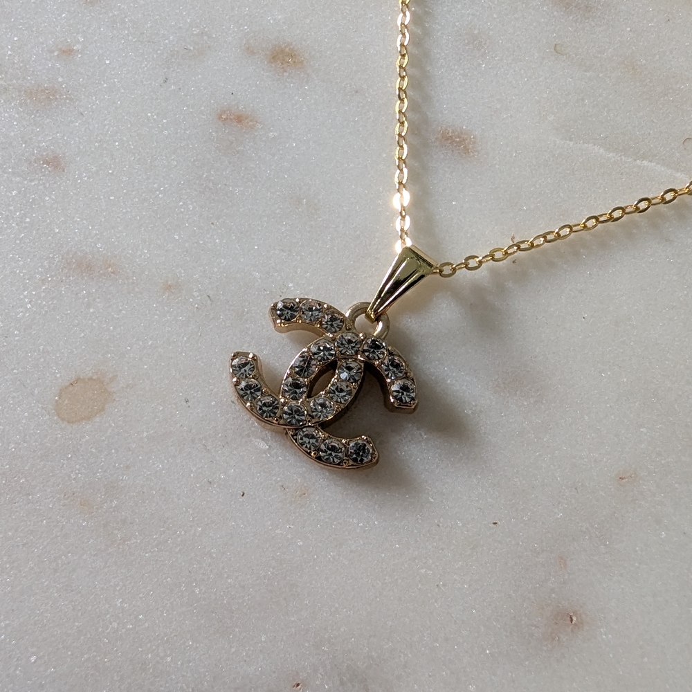 CHANEL Gold Pendant Necklace